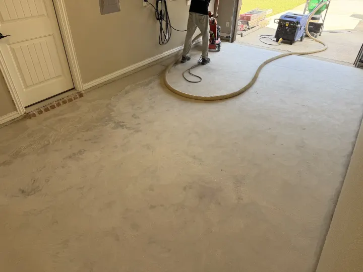Grinding photo of garage floor coating project in Colleyville, Texas.