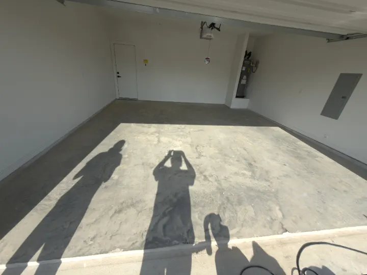 Before photo of the Azle, Texas garage floor coating project