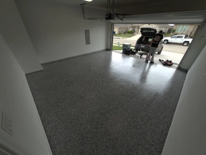 Garage floor with Domino flake epoxy coating in Azle, Texas.