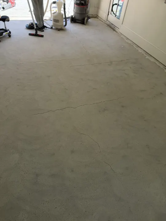 Grinding photo of the garage floor coating project in Fort Worth, Texas.
