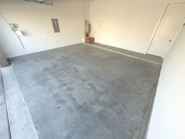 Before photo of a 400 sq ft garage floor coating project in Fort Worth, Texas.