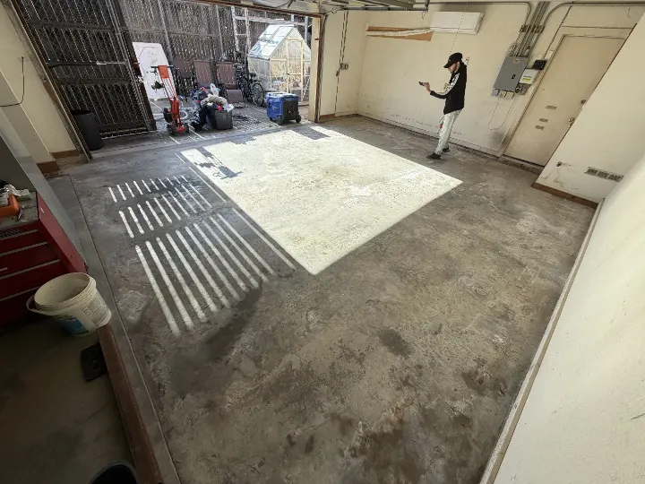 Before photo of the 440 sq ft garage floor in Irving, Texas.