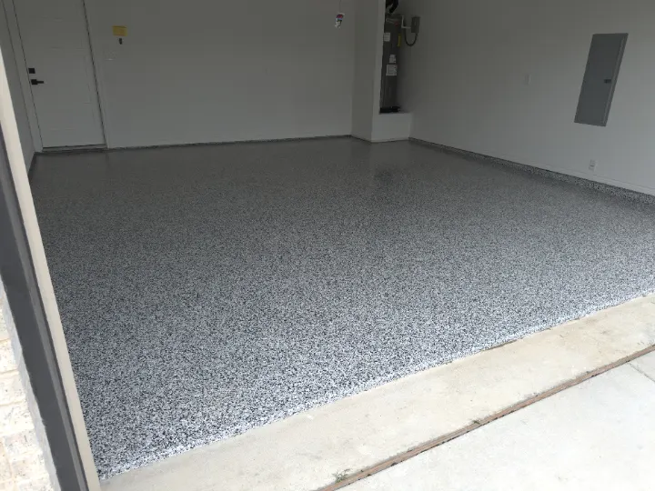 Garage floor with Domino flake epoxy coating in Azle, Texas.