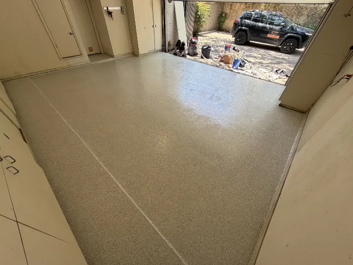 Interior view of a completed Opal full-flake epoxy garage floor in Dallas, Texas.