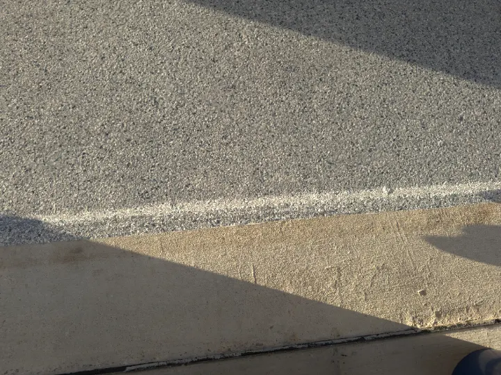 Close-up of Domino flake epoxy coating on a garage floor.