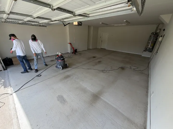 Wide view of a Frisco garage before floor coating.